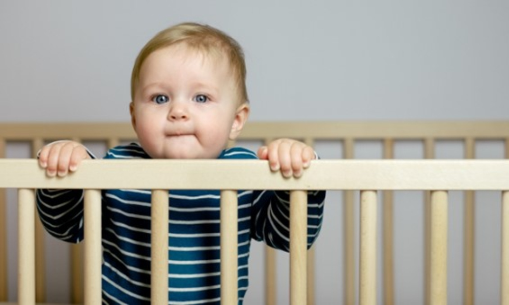 signs your baby is outgrowing their crib